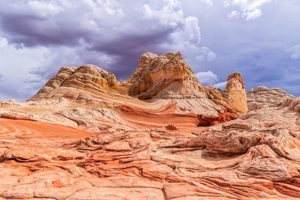 Red, yellow and white swirls of sandstone rock formations at White Pocket, Vermillion Cliffs National Monument, Arizona.